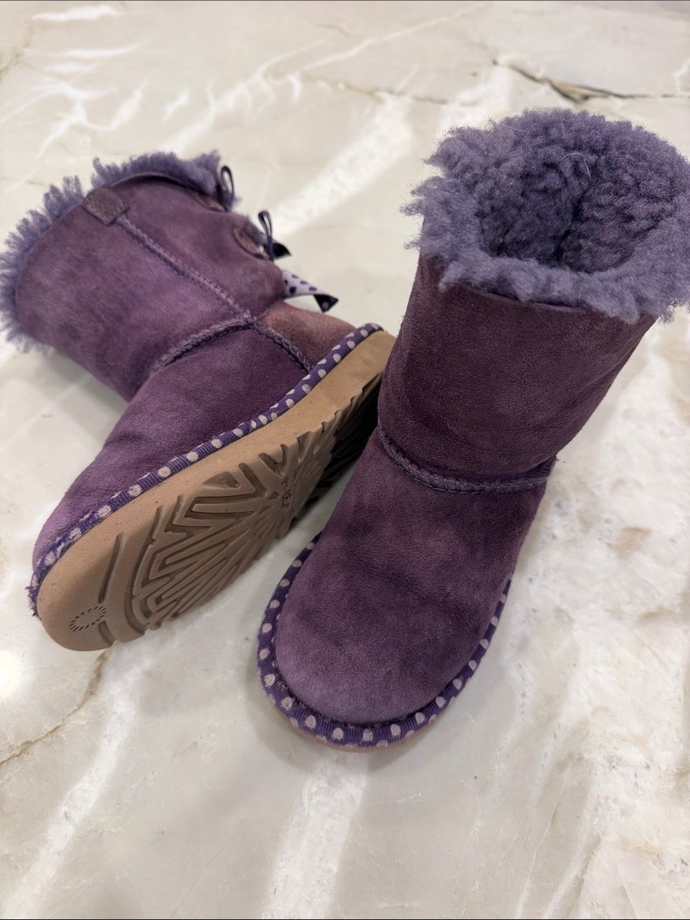 Purple bow Uggs